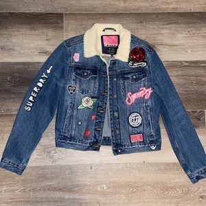 Women’s Super Dry blue denim jean jacket w/ patches size small